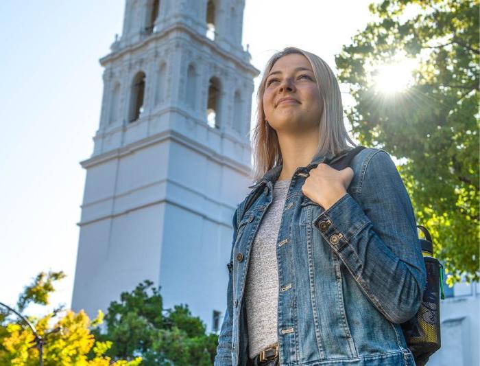 Proud student looks into the distance